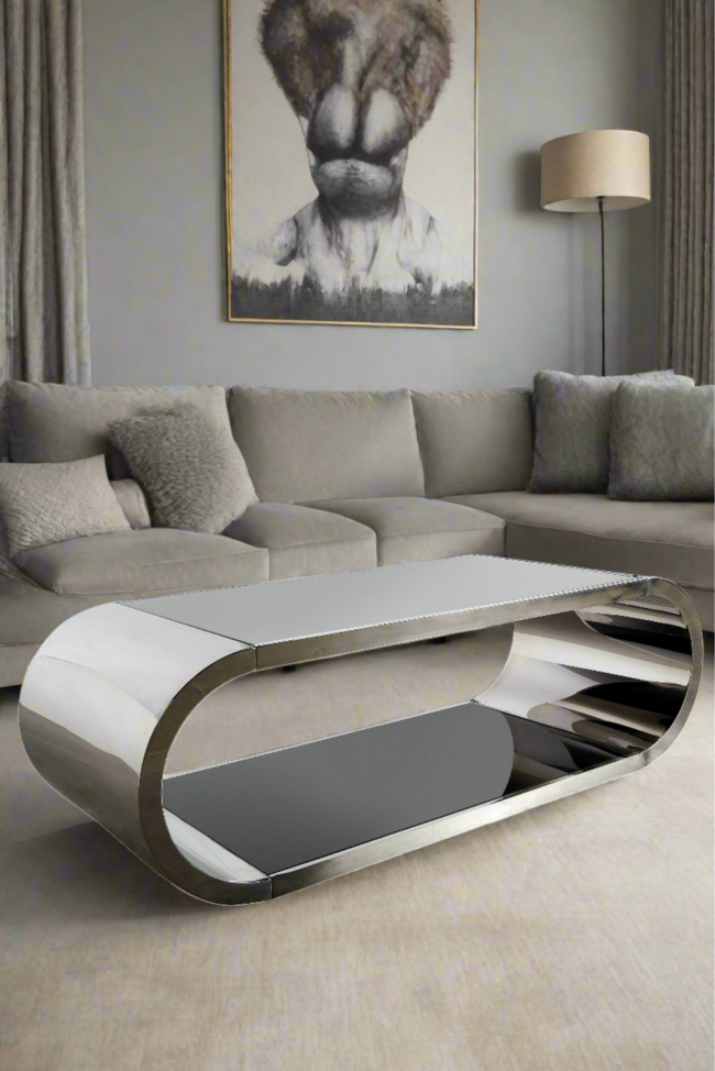 Pia Chrome Coffee Table". It is also described as a "contemporary Zespoke 'Hoop' polished chrome coffee table". living room table - Image 4