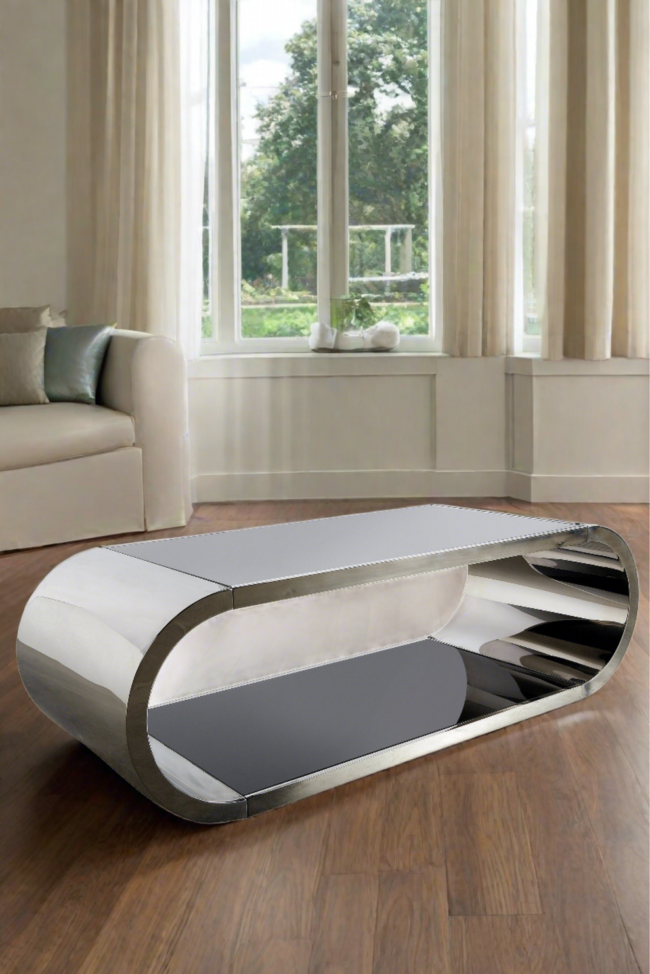 Pia Chrome Coffee Table". It is also described as a "contemporary Zespoke 'Hoop' polished chrome coffee table". living room table - Image 3