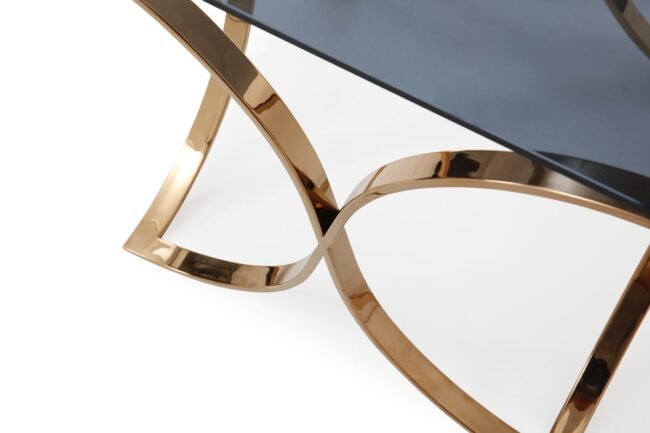* Emphasizes the table's contemporary style and geometric base.
Sleek Rose Gold End Table - Image 4