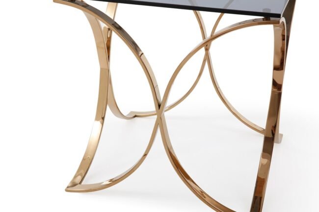 * Emphasizes the table's contemporary style and geometric base.
Sleek Rose Gold End Table - Image 3