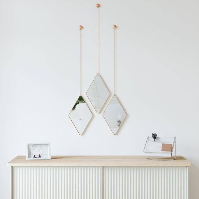 Diamond Hanging Wall Mirrors, Set of 3, Rose Gold/Copper Finish
   * Hanging Wall Mirrors: Clearly states the product type.
   * Set of 3: Indicates the quantity included.
   * Rose Gold/Copper Finish: Accurately reflects the unique color and finish. - Image 3