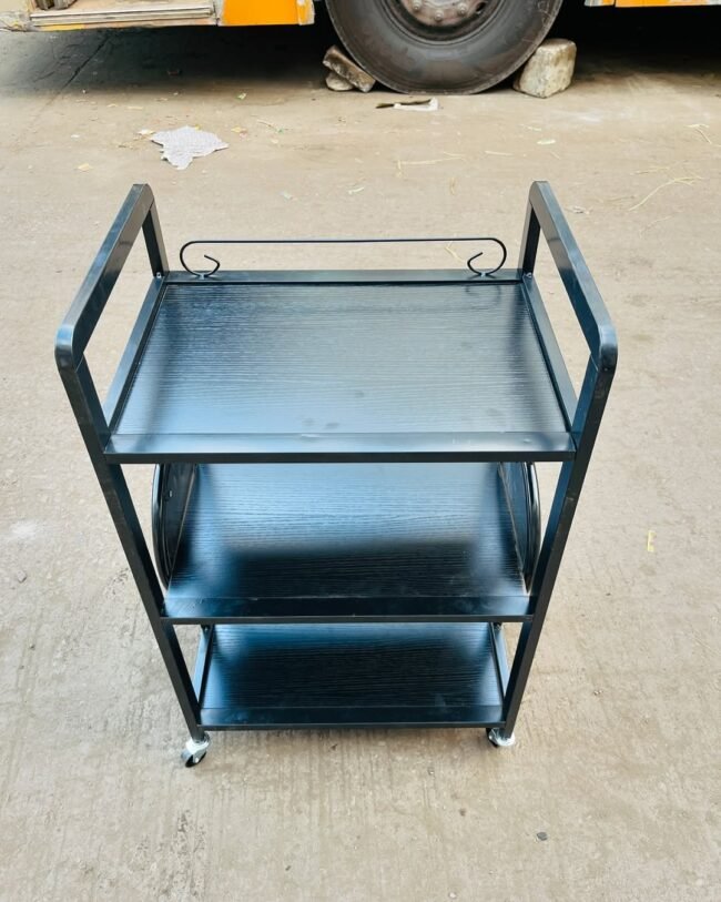 black, three-tiered metal utility cart with wheels, designed for portability - Image 3